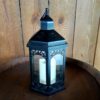 Black plastic lantern with faux candle